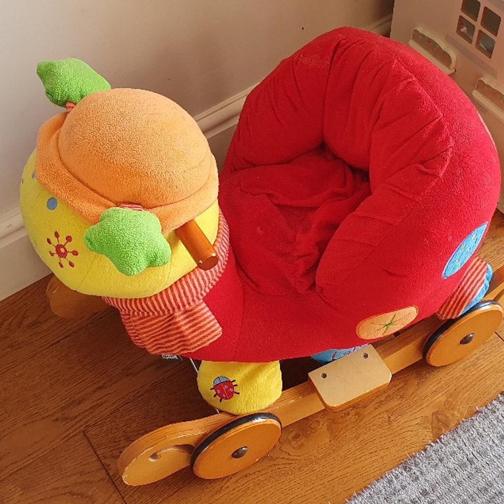 Lottery snail can be used as a rocker or ride on, musical sounds play when you squeeze the antennas. Good condition could just do with a clean.
