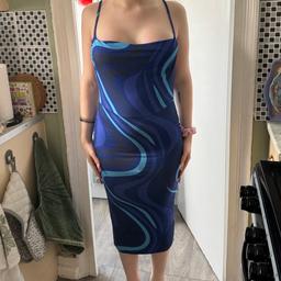 Only been worn twice but like new. Size 10UK. Has a beautiful bodycon effect. Great for an evening dress and everyday wear.