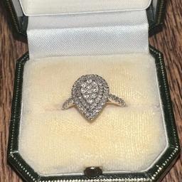A truly stunning 9ct white gold diamond ring, 0.50 carat of sparkling diamonds in a double halo pear shape setting, fully hallmarked for gold and diamond content, approx size L