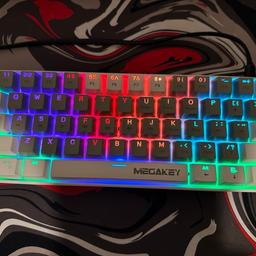 MEGAKEY 60% gaming keyboard

It has LED with different pattern
Blue switches
It’s hot swappable switches can be changed
Comes with extra switches
Comes with full box including usb c wire keycap puller and extra switches

ITS COMPLETLY NEW I NEVER USED IT I CAN PROVIDE YOU WITH MIRE VIDEOS THAT ITS COMPLENTLY NEW AND CLEAN