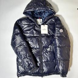 Discover the ultimate winter essential - Moncler padded down jackets. With a range of sizes and colors including black and navy, we have your style covered. Shop now and upgrade your wardrobe