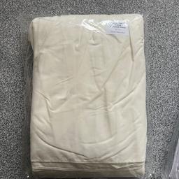 Brand new king size valance sheet in cream with 16 inch frill, never been opened