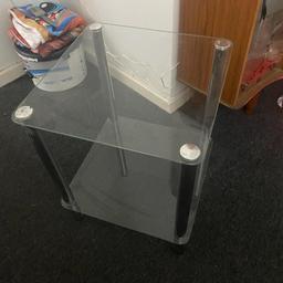 CLEAR Glass Coffee Table/ Lamp Table COLLECTION ONLY
 2 Tiers Small Display Stand
has a mark on one of the corners
REASONABLE OFFERS CONSIDERED
15X15 INCH APPROX