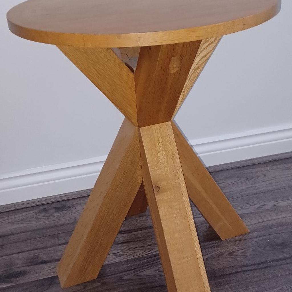 lovely solid wood side table , a couple of very slight marks but hardly noticeable, buyer to collect and pay cash please. Other Oak furniture will be becoming available, Large dining table, side board and display cabinet.