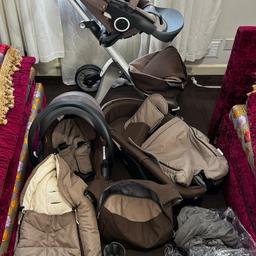 Stokke xplory v5 travel/ pushchair system set plus extras.
 Includes
Xplory Chassis
Xplory Seat Unit
Xplory Carrycot
Stroller Seat Rain Cover
Stroller Seat Mosquito/summer Net
Xplory Shopping Bag

Xplory Changing bag, purse and changing mat
Xplory Cup holder
Xpolory Footmuff

iZi Go Modular Car Seat by BeSafe