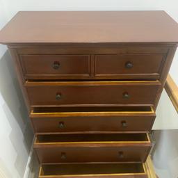 Tall 6 Drawer chest in excellent condition in like a solid dark rose wood colour. Very well made and heavy. At the base are two deep drawers then two medium depth and two deep singes at the top.£85
Sizes are
W38”. D19”. H49”