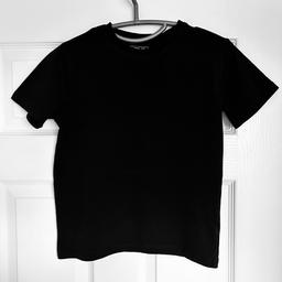 Plain black T-Shirt 
Age 9
From a smoke free home
Collection only from tibshelf