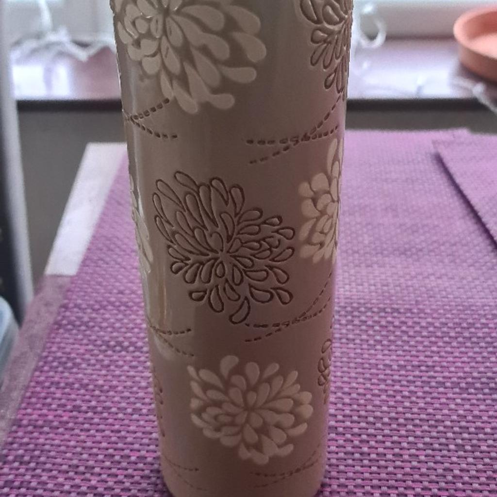Large floral vase. Beige colour.
