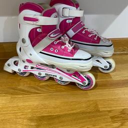 Pink roller blades, converse style. Size 3-6. Minimal signs of wear, great condition.