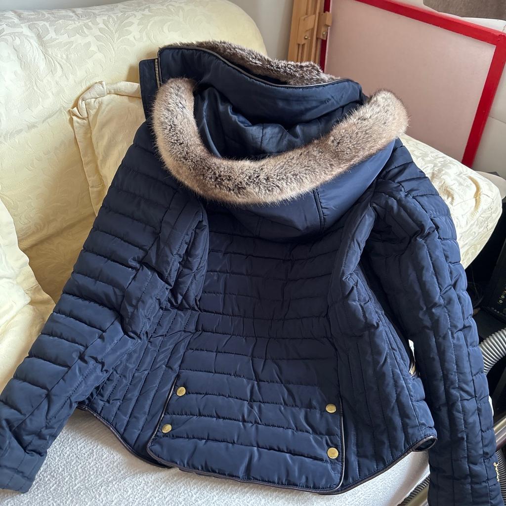 Navy joules padded jacket with hood faux fur trim. Great condition hardly used. Buyer collect only. Bought new for £120