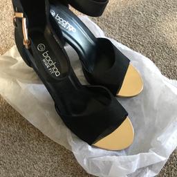 Black suede effect block heel sandals. Ankle strap wide fit. As new tried on but never worn.