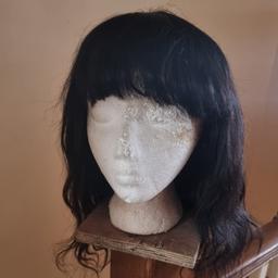 Ladies Human Hair Body wave wig. Natural black. Bangs. Brazilian human hair. Shoulder length. Has bands inside for comfy fit. Bought from and customised by Ali Express but never worn in the end. Hair very soft. Cute!