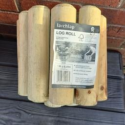 brand new larch lap log edging roll in original perfect condition ready to use, size 9 inch high x 6 feet long, only £4