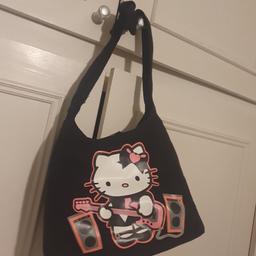 Hello Kitty Bags, fabric: canvas, with pattern on both sides and inside out use. size 24 x19x15cm