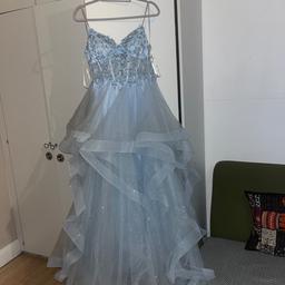 Bought it for £460. Great condition however, there is slight fake tan stains on the straps and it’s slightly dirty at the bottom. Beautiful dress. Can negotiate prices