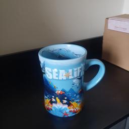 large mug from Sea life centre. been in display cabinet since purchased. no lower offers.