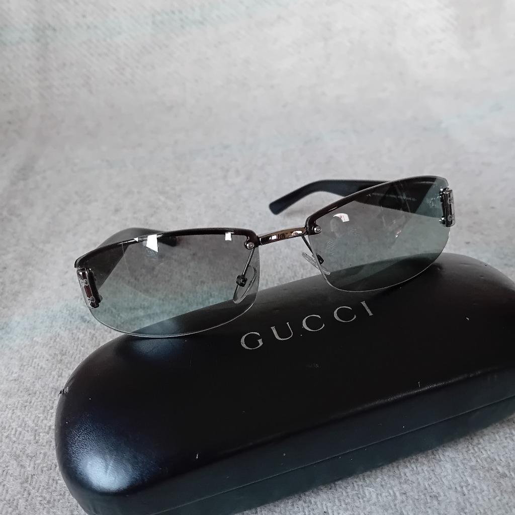 lovely gucci sunglasses like new bought from menorca Airport .with original hard case ..