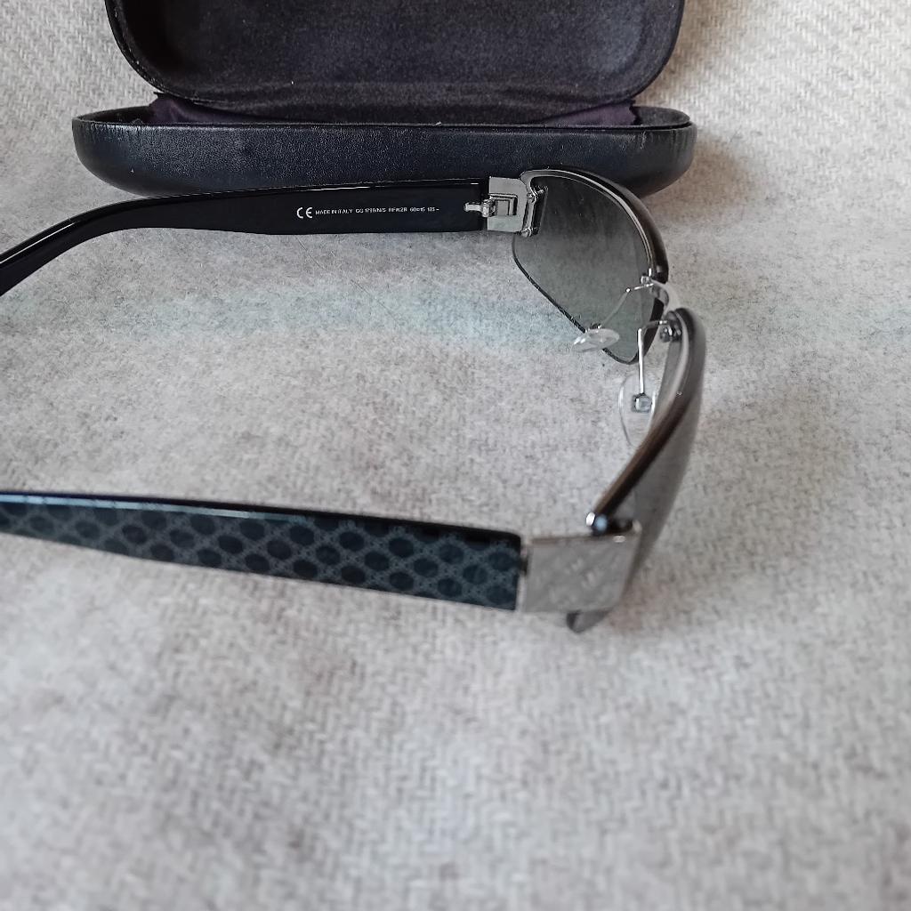 lovely gucci sunglasses like new bought from menorca Airport .with original hard case ..