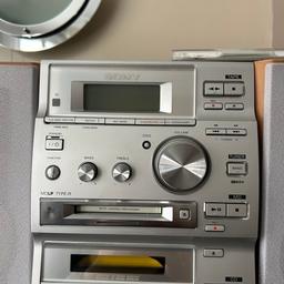 Sony system plays cd’s and cassettes for whoever likes to play pictures describes the item. PICK UP ONLY.     The speakers are not stuck to the system .