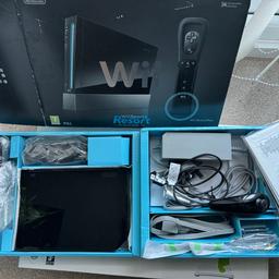 Nintendo Wii and Wii Fit board, two controllers plus a small controller with joystick. Wii Sports, Wii Sports Resorts, Mountain Sports, Word Brain and Puzzler games included.
Console box is complete with stand included.