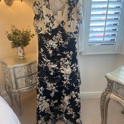 New with tags.
Beautiful Lipsy dress colour is black & cream.
Label says size 18 but it’s a small fitting more like a size 14/16
Bought for a wedding last year but didnt wear it.