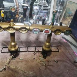 Hi I have 2 vintage brass beer pumps and there was bought from house clearance and been in my unit for few month they are lovely looking pumps and for any man cave or vintage bar I think they look fabulous don't there are 2 separate one one 3 taps and one Is 4 taps feel free to ask any questions collection from Aston b6 no timewaster only serious buyer can deliver local for extra fuel cost no Paypal no bank transfer only cash only