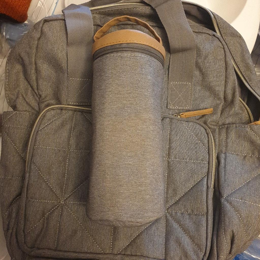 brand new never used baby bag with bottle holder and foldable changing mat comes as a matching set in grey so can be used for boy or girl collection only wv2 £12