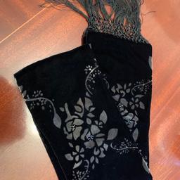 Luxurious black velvet embellished scarf
Patterned with beaded decoration
54” plus 2 x 6” fringing at each end
6” width
Velvet on both sides.
Excellent condition as not worn