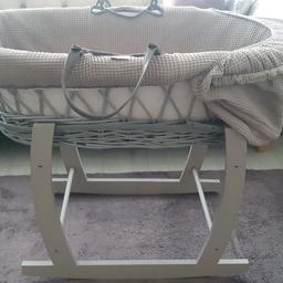 Like new moses basket. Unisex. 

Great thing about the moses stand is that it rocks too and so great for getting baby to sleep! 

Also has an inbuilt canopy. 

Come with moses stand and mattress with washable cloud cover. 

Currently on sale online for £40

£15 ONO - quick sale so please provide offer...