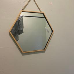 Brand new mirror for sale

It has been painted gold but can easily be removed without damaging the base colour
(Black)
