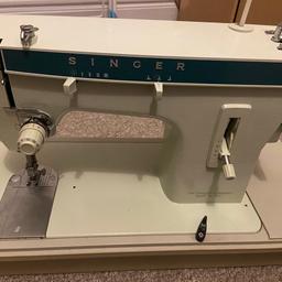 Vintage Singer sewing machine with carry case, foot pedal and accessories 

Fully working condition 
A very solid heavy item so collection only