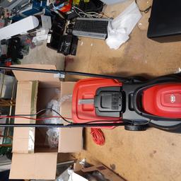 new lawn mower by webb corded 240v .ready for use. exdisplay