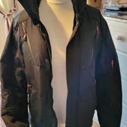 black 2xl jacket waterproof  long jacket.
removable hood. has thumb gloves on arms. reason for selling unwanted  Xmas pressi  also to warm for me. can be worn by women or men.Can post if required  but  will need to get price