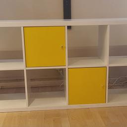 Popular Ikea Kallax 8 cube unit, with 2 yellow door inserts. Great condition.

Brand new this would cost £80 - £50 for the unit, and £15 each for the door inserts.

Collection only.