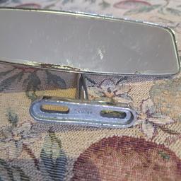 Classic car interior mirror.  Old, so in used condition.  Hence price. Collection only from Stourbridge.  Delivery/postage is not available.