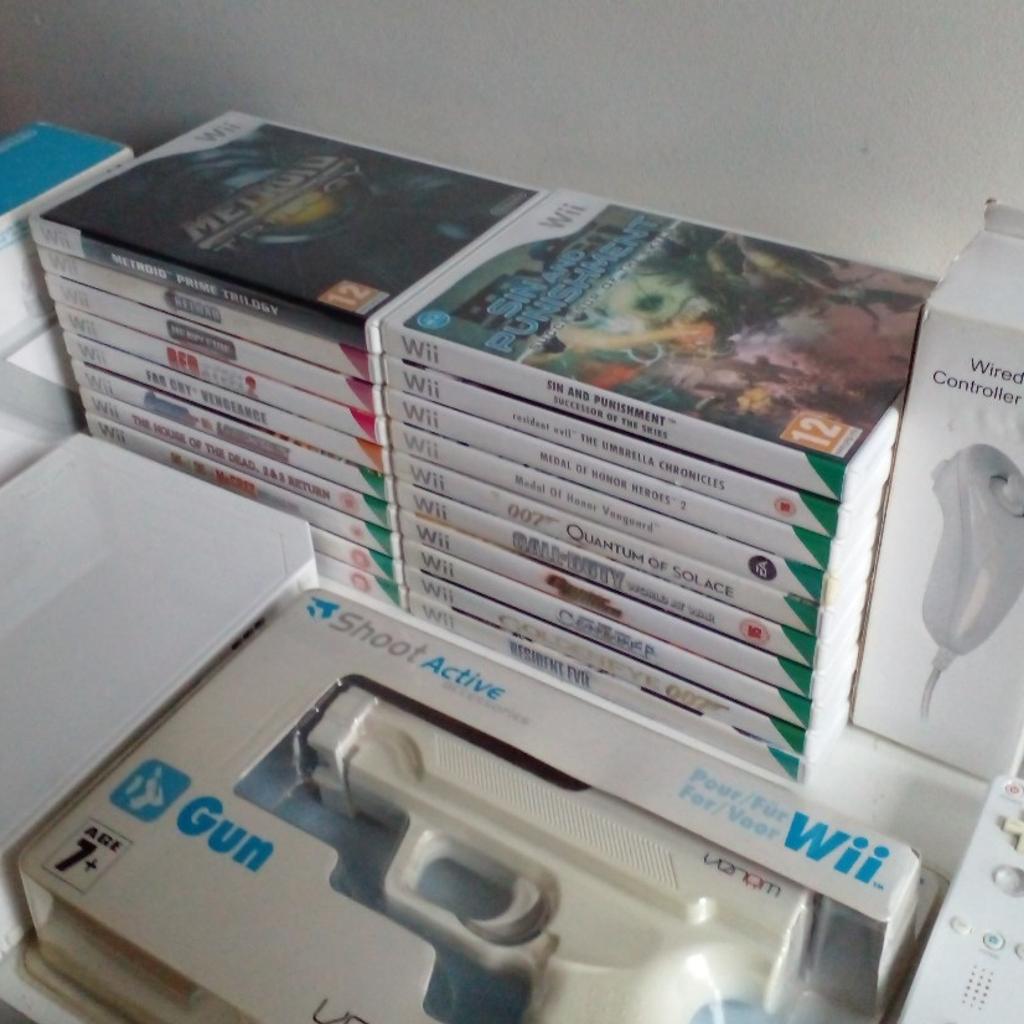 This is an original Nintendo Wii console with the ultimate First Person Shooter & LightGun Collection ...

Here we have all of SEGA's classic arcade gems along with some other rare & expensive titles,

Bundle includes all leads,Sensor ,Wii Zapper ... shooter accessories,1 Wii motion 1 official remote with NuChuck & 21 games.

Call Of Duty World At War
Dead Space Extraction
FarCry Instincts
Ghost Squad
GoldenEye 007
Gunblade NY + LA Machineguns
House Of The Dead Returns
House Of The Dead Overkill
Heavy Fire Afghanistan
Links Crossbow Training
Metroid Prime Trilogy
Mad Dog Mcree Triple Pack
Medal Of Honor Hero's 2
Medal Of Honor Vanguard
Quantum Of Solace 007
Red Steel 2
Resident Evil -The Umbrella Cronicals
Resident Evil -The Darkside Cronicals
ReLoad
Sin And Punishment Successor Of Skies
The Conduit

These are used items

Cash on collection/local delivery or post available