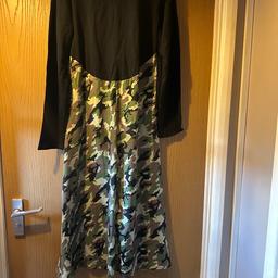 Never worn Zara dress, Black & combat 3/4 length. round neck with fitted arms and slight flare bottom.
Would look great with doc martens and leather jacket.

Free collection from LE4 5RB area or post if preferred