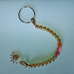 Beautiful keyring, handmade, perfect gift for Mother's Day, not suitable for children under 3 years old, £1.95 p&p.