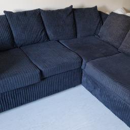 This modern Luxor jumbo cord fabric corner sofa suite is perfect for any room in your home. The sofa is 212cm long and 87cm deep, comfortably seating up to four people. It features a classic round arm style and a scatter cushion back for optimum comfort.


The black upholstery fabric is made of high-quality corduroy material, and the frame is made of sturdy wood. The sofa is in excellent condition and does not require any additional parts. This corner sofa suite is a perfect addition to your living room, home office/study, or dining room.


The right arm rest has a sink middle internal panel.

Collection from South Norwood SE25.