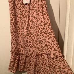 Brand new dress,with tags,age 6/7 years,great for summer/holidays