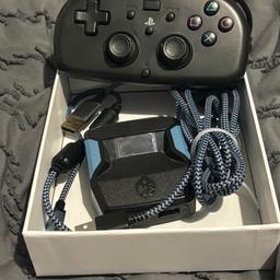 Cronus Zen with Wires and PS4 hori, includes a headphone jack adapter