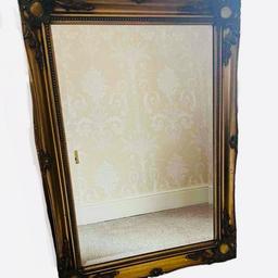 Beautiful ornate antique gold mirror

Gilded and carved wooden Baroque or rococo style frame

Bevelled glass

91cm (3ft) by 65cm (2ft 1.5in)
