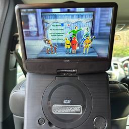 Large 9" Inch Portable DVD Player with Flat Bright and deep colour LCD Screen.

Remote Control. (will need new battery)
CD Playback. 
In Car back seat mounting Kit. 
Mains Powered, 12v car lighter plug and rechargeable battery inbuilt. 
Headrest mounting bracket (the clip is broken but still clips into mounting bracket and holds dvd player in place) see picture.

Will post or can collect from Orrell, Wigan