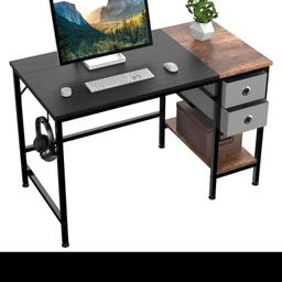 Here i have for sale is a Homidec computer desk in black and rustic brown. It comes flat packed with instructions as its brand new in box. The sizes are displayed in the pictures. The drawers are fabric. Thanks for looking. Any questions please ask away. Cash only please.