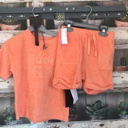 THIS IS FOR A DESIGNER OUTFIT SET

1 X ORANGE SHORT AND SWEATSHIRT STYLE TOP FROM FUDO - TERRY TOWLING EFFECT MATERIAL - COST £19 

PLEASE SEE PHOTO