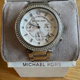 Woman’s Michael Kors Designer Watch - Silver with original box.
