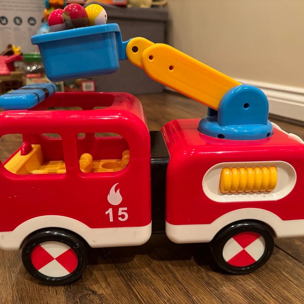 Kids Fire Engine Toy with people.