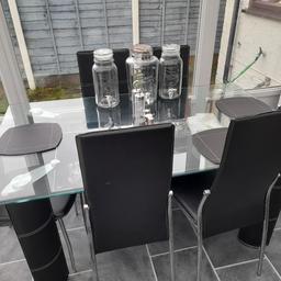 6 seater black glass dining table, excellent condition with extra surface underneath. COLLECTION ONLY