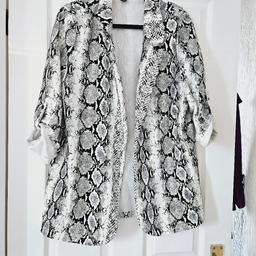 Black and white animal pattern jacket, non fastening and has fasten up sleeves, generous size 14..NEW without tags.

cash and collection only, thanks.
possible delivery to Conisbrough on Saturday mornings only around 11 am.
