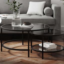 Black metal and glass coffee nest tables with dark tempered glass rounded tables so no corners
Small table fits under large table so space saving
Also selling matching side tables and sofa table
Pet and smoke free house